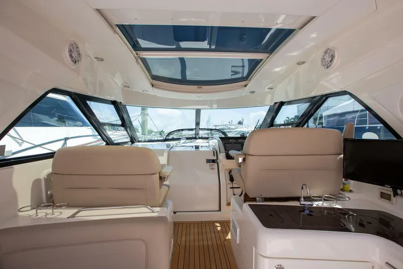  Yacht Photos Pics Interior of 2015 Sea Ray 450 Sundancer yacht with luxurious seating and panoramic windows.