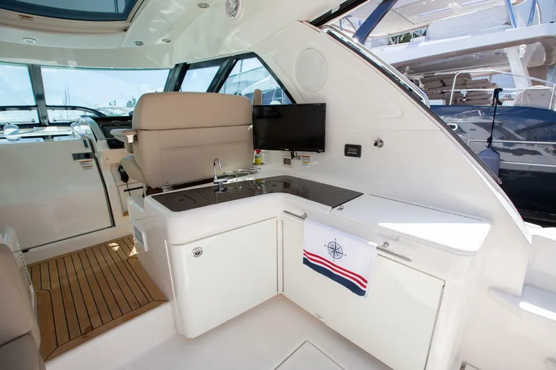  Yacht Photos Pics Luxurious interior of 2015 Sea Ray 450 Sundancer yacht with modern amenities.