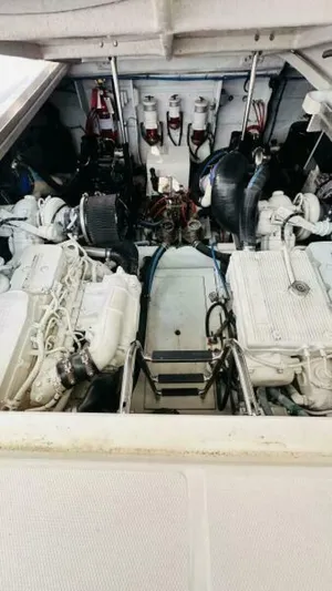  Yacht Photos Pics Engine room of a 2015 Sea Ray 450 Sundancer yacht, showcasing dual engines.