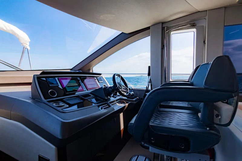 O Legasea Yacht Photos Pics Interior helm of 2018 Sunseeker Manhattan 66 yacht with ocean view.