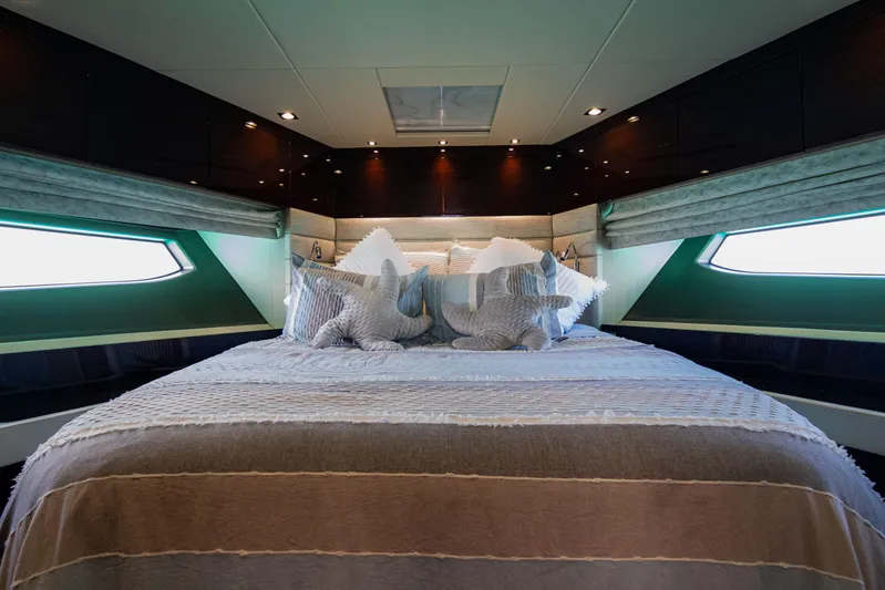 O Legasea Yacht Photos Pics Luxurious bedroom interior of 2018 Sunseeker Manhattan 66 yacht with elegant bedding.