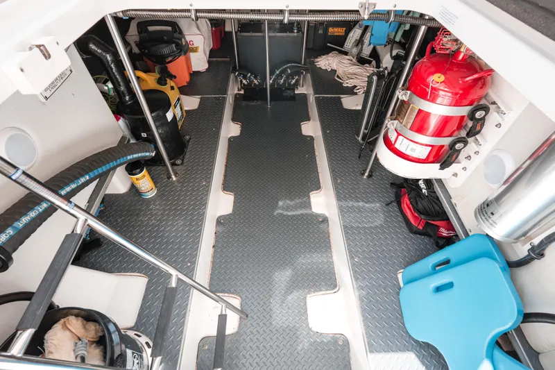 No Name Yacht Photos Pics 2022 Formula 500 Super Sport Crossover engine room with equipment and storage.