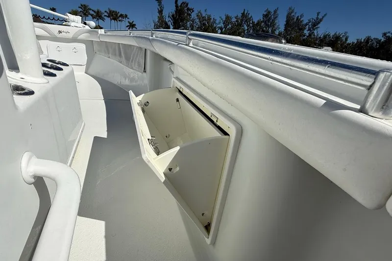  Yacht Photos Pics 2017 Yellowfin 26 Hybrid boat interior with open storage compartment.