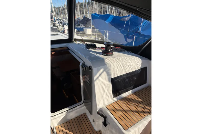 Atticus Yacht Photos Pics Cockpit of Atticus with wooden flooring and winch.