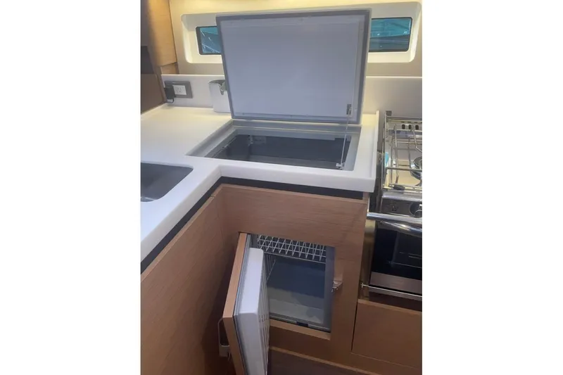 Atticus Yacht Photos Pics Main refrigerator with convenient top and front access. No reaching down into a deep compartment searching for food items.