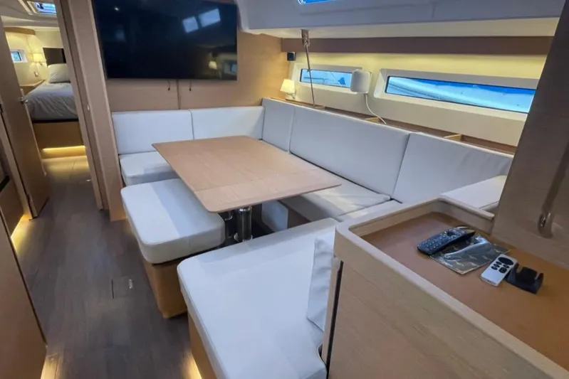 Atticus Yacht Photos Pics Setee and dining area looking forward.