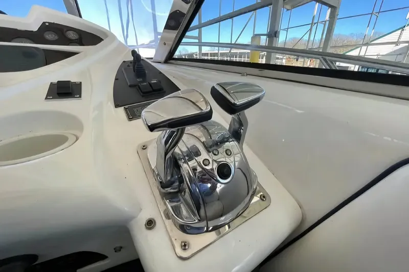  Yacht Photos Pics Control panel of a 2004 Sunseeker Predator 56 yacht, featuring sleek throttle levers.