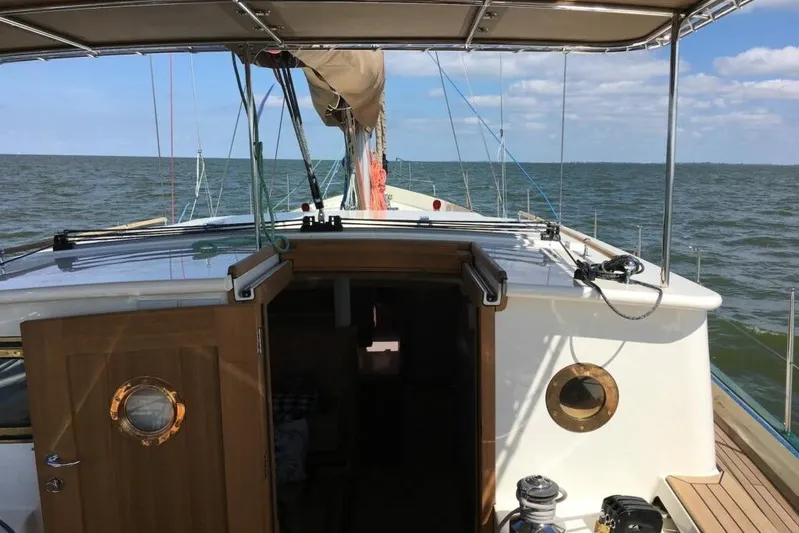 Jaleo Yacht Photos Pics Sailing on a 2019 Puffin 50 yacht, open sea view, clear skies.