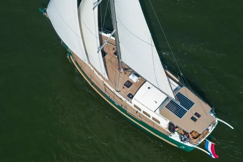 Jaleo Yacht Photos Pics Aerial view of 2019 Puffin 50 sailboat with solar panels on deck.