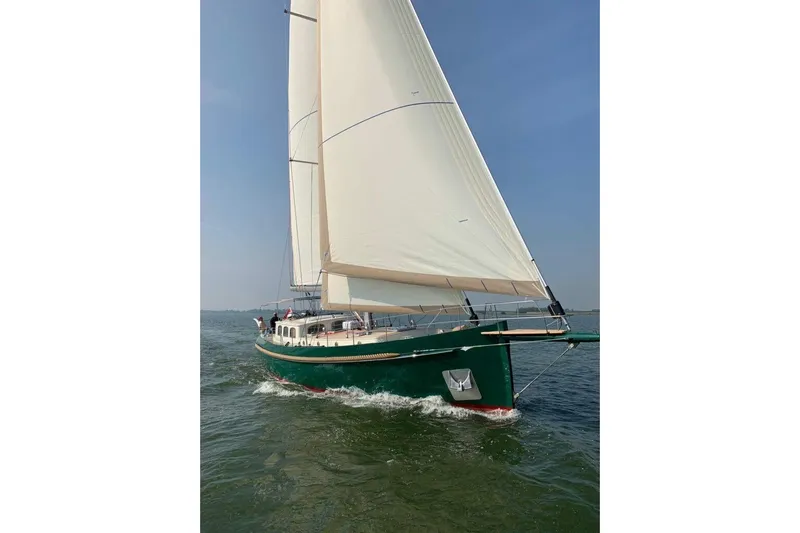 Jaleo Yacht Photos Pics Sailing yacht Puffin 50, 2019 model, gliding on open water under clear skies.