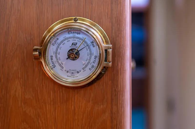 Jaleo Yacht Photos Pics Brass barometer on wooden wall, Puffin 50 model, 2019.