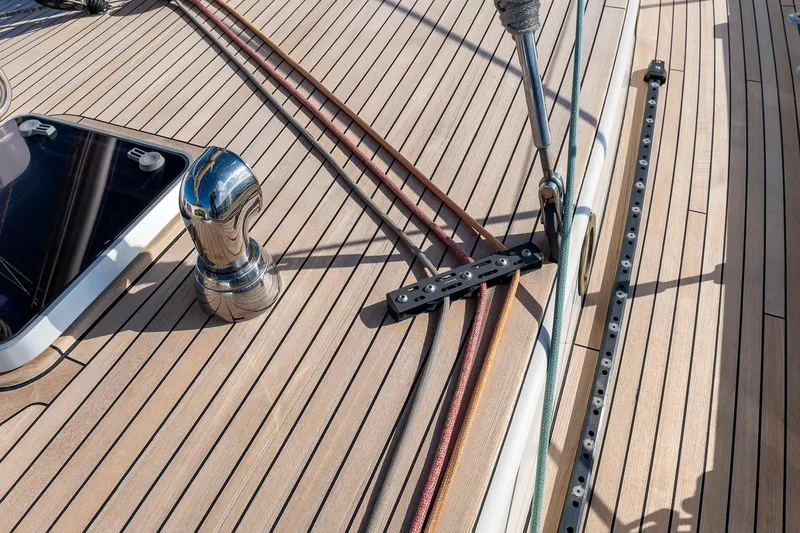 Jaleo Yacht Photos Pics Teak deck of 2019 Puffin 50 yacht with polished fittings and rigging details.