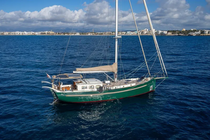 Jaleo Yacht Photos Pics Sailing yacht Puffin 50, 2019 model, cruising on blue ocean near coastal city.