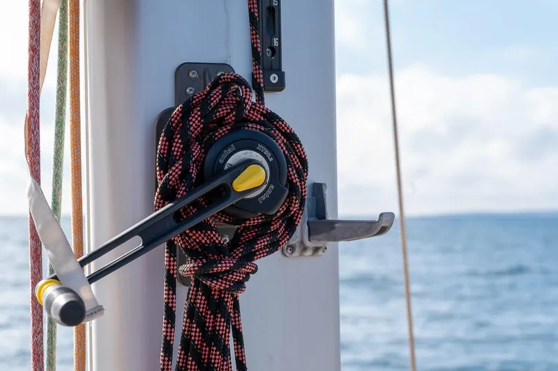 Jaleo Yacht Photos Pics Sailboat winch with ropes on Puffin 50, 2019 model, at sea.