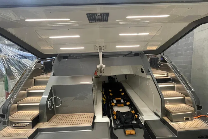  Yacht Photos Pics 2024 Cranchi 67 Sessantasette Fly yacht interior with modern lighting and sleek design.