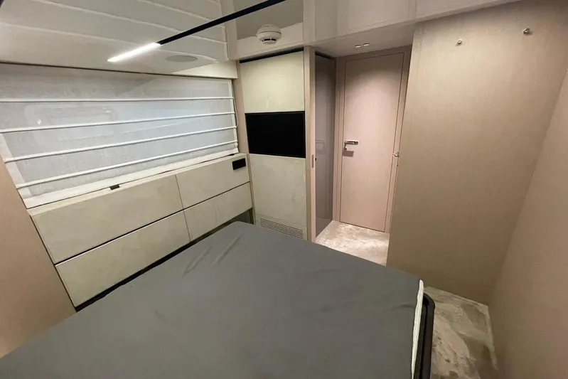  Yacht Photos Pics 2024 Cranchi 67 Sessantasette Fly cabin interior with modern design and sleek furnishings.