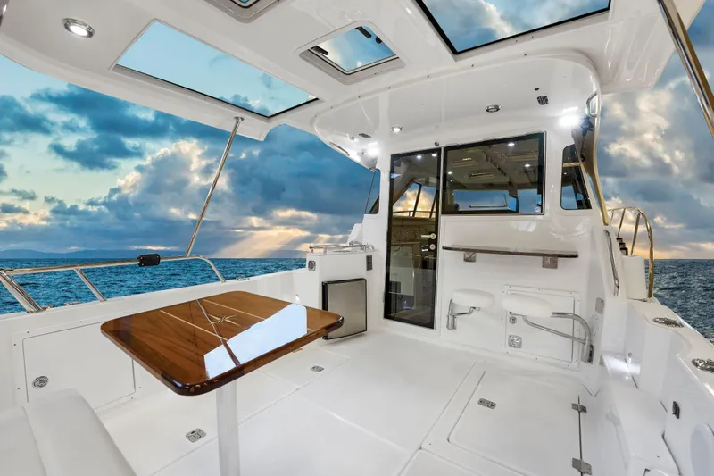  Yacht Photos Pics Luxurious 2026 Aspen C107 yacht interior with ocean view and modern amenities.