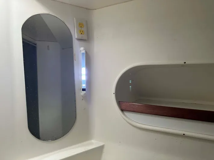 Felice Yacht Photos Pics Interior of 1998 Fountaine Pajot Athena 38, featuring a mirror and shelf.