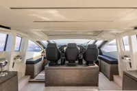 Interior of 2016 Pershing 82 yacht cockpit with modern seating and panoramic windows.