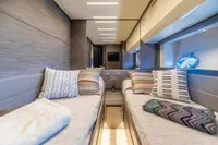 Luxurious interior of 2016 Pershing 82 yacht with twin beds and stylish decor.