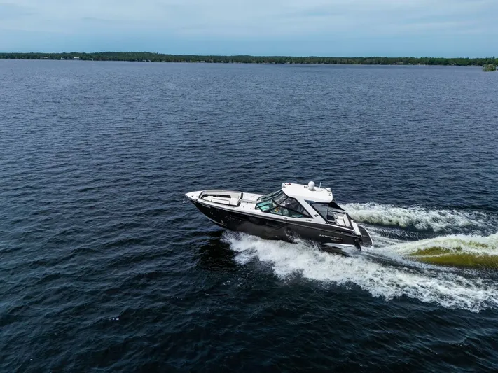  Yacht Photos Pics 2017 Monterey 378 Super Express cruising on open water.