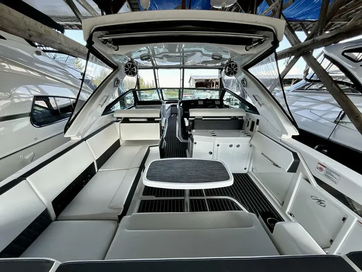  Yacht Photos Pics 2017 Monterey 378 Super Express boat interior with seating and table.