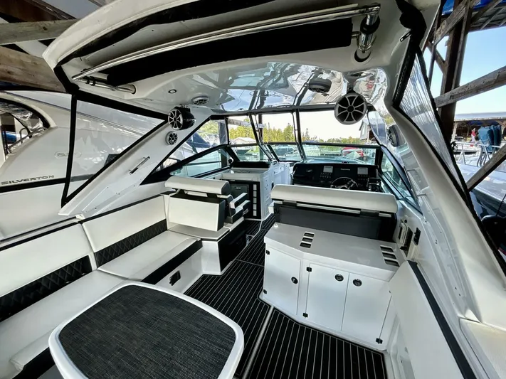  Yacht Photos Pics Interior of 2017 Monterey 378 Super Express boat with modern seating and controls.