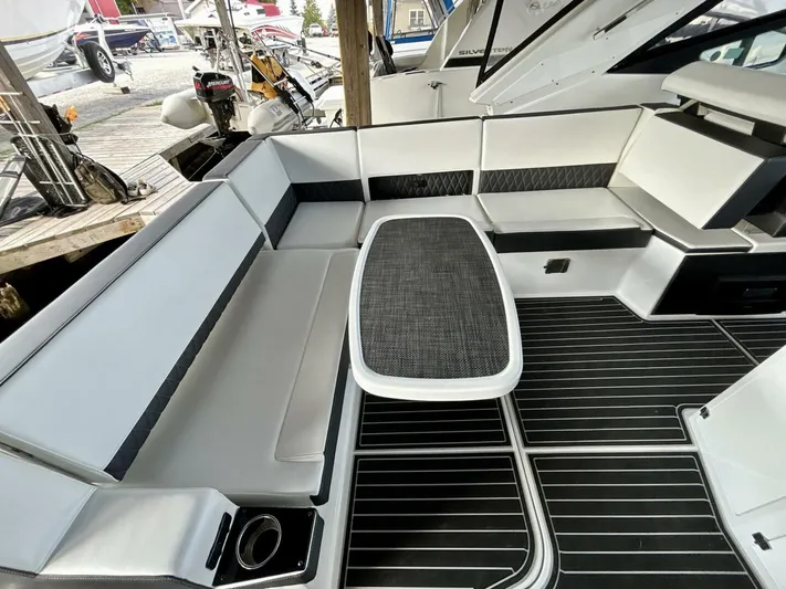  Yacht Photos Pics 2017 Monterey 378 Super Express boat interior with sleek seating and modern design.
