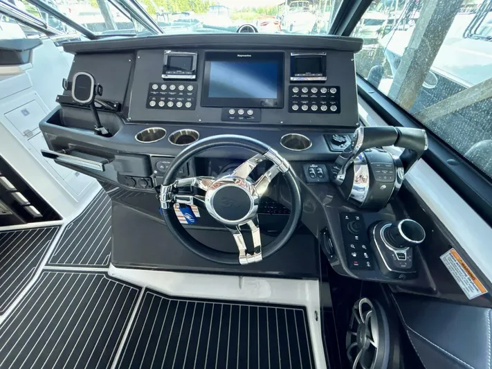  Yacht Photos Pics 2017 Monterey 378 Super Express helm with advanced controls and navigation system.