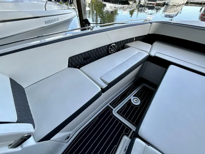  Yacht Photos Pics 2017 Monterey 378 Super Express boat interior with white seating and black accents.