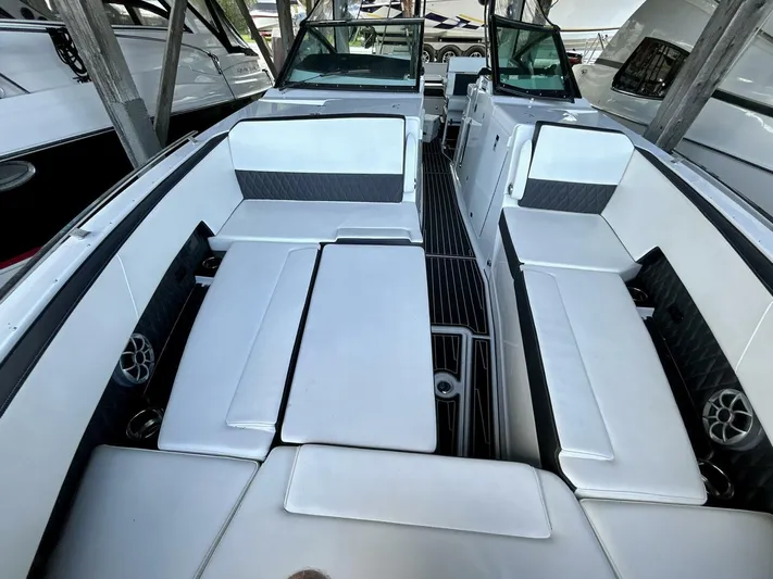  Yacht Photos Pics 2017 Monterey 378 Super Express boat interior with white seating and sleek design.