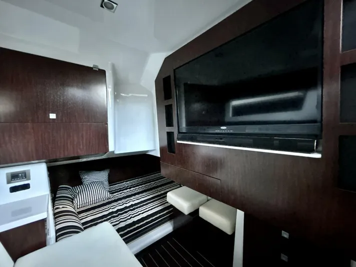  Yacht Photos Pics Interior of 2017 Monterey 378 Super Express yacht with TV, bed, and modern design.