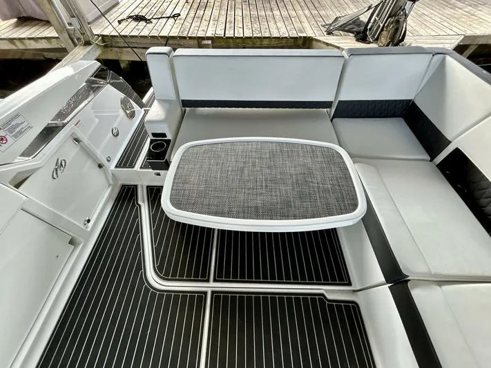  Yacht Photos Pics 2017 Monterey 378 Super Express boat interior with seating and table.