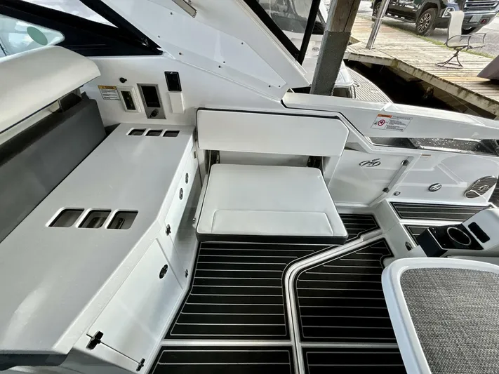  Yacht Photos Pics 2017 Monterey 378 Super Express boat interior with white seating and sleek design.