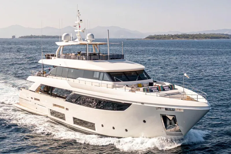  Yacht Photos Pics Luxurious 2018 Customline Navetta 33 yacht cruising on open sea.