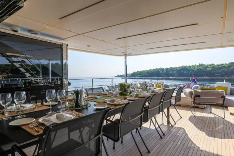  Yacht Photos Pics Luxurious dining area on 2018 Customline Navetta 33 yacht with ocean view.