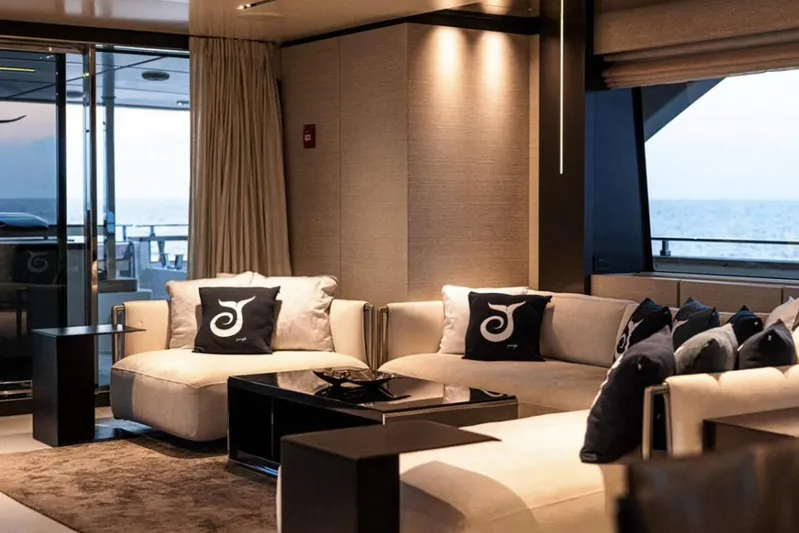  Yacht Photos Pics Luxurious interior of 2018 Customline Navetta 33 yacht with elegant seating and ocean view.