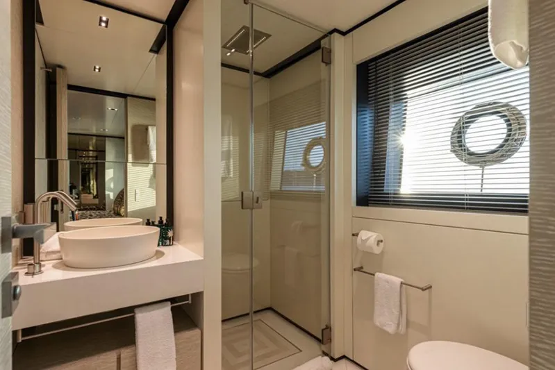  Yacht Photos Pics Luxurious bathroom in 2018 Customline Navetta 33 yacht with modern fixtures and elegant design.