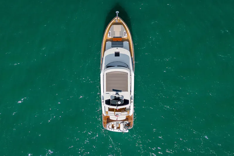 Viakarey Yacht Photos Pics Aerial view of 2023 Sirena 58 yacht on turquoise water.
