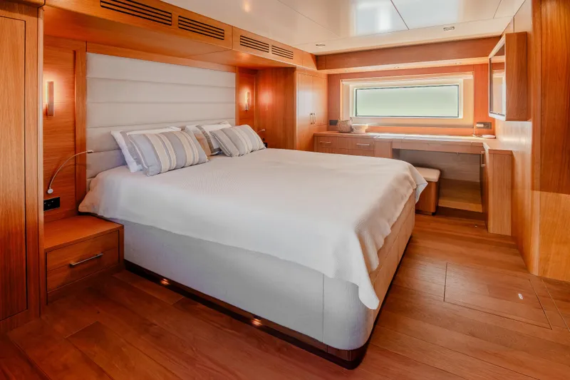 Viakarey Yacht Photos Pics Luxurious cabin interior of 2023 Sirena 58 yacht with modern wood finishes.