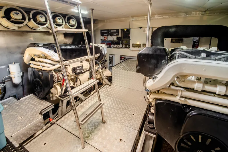 Viakarey Yacht Photos Pics Engine room of 2023 Sirena 58 yacht with dual engines and ladder access.