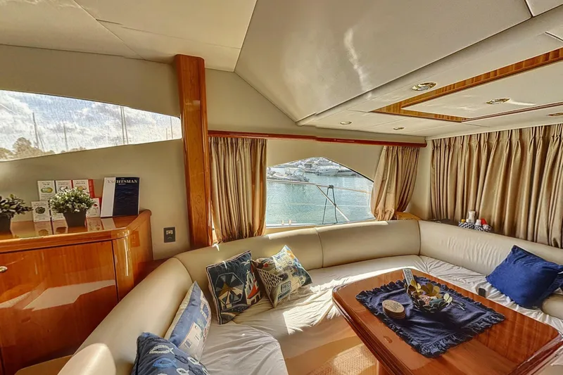  Yacht Photos Pics Luxurious interior of 2006 Sunseeker Manhattan 50 yacht with elegant seating and decor.