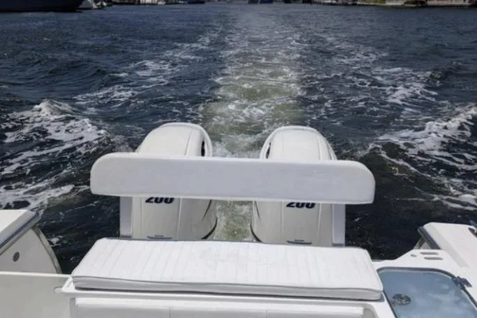  Yacht Photos Pics 2016 Southport 272 TE boat with twin 200 engines cruising on water.