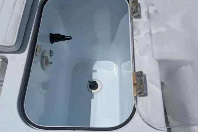  Yacht Photos Pics Livewell compartment on a 2016 Southport 272 TE boat, open and empty.