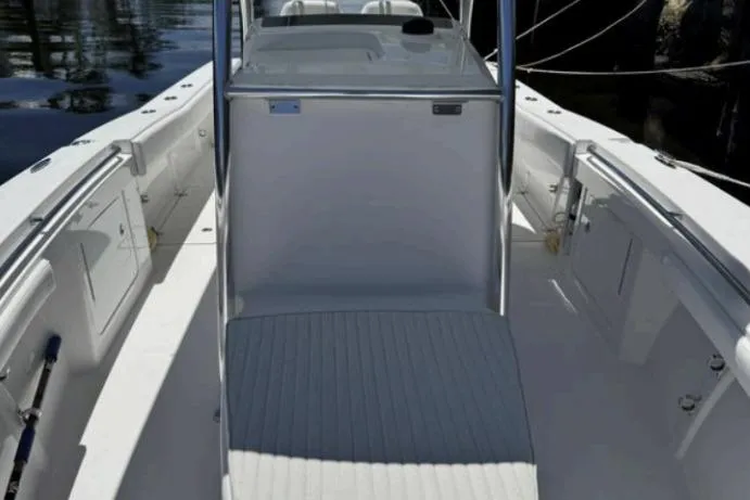  Yacht Photos Pics 2016 Southport 272 TE boat interior with sleek white deck and console.