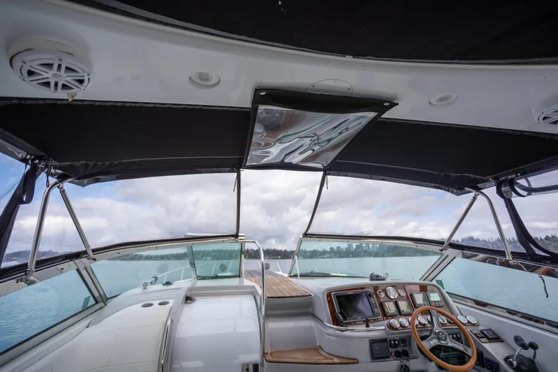  Yacht Photos Pics Interior view of 2005 Formula 400 Super Sport boat cockpit with steering wheel and controls.