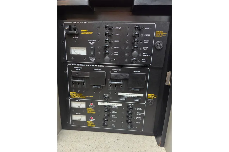  Yacht Photos Pics Control panel of a 2005 Formula 400 Super Sport boat, featuring various switches and gauges.