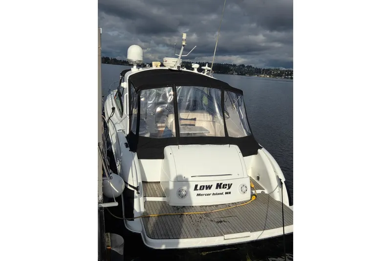  Yacht Photos Pics 2005 Formula 400 Super Sport boat docked on a cloudy day.