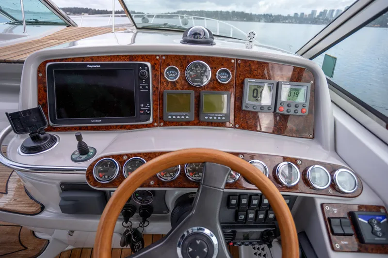  Yacht Photos Pics Dashboard of a 2005 Formula 400 Super Sport boat with navigation instruments.