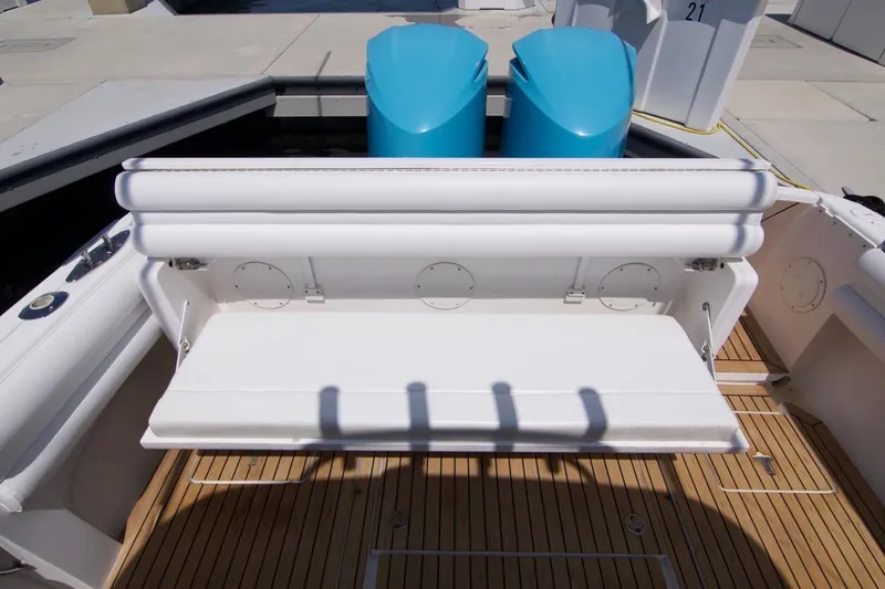  Yacht Photos Pics 2013 Intrepid Center Console boat with white seating and teak deck.